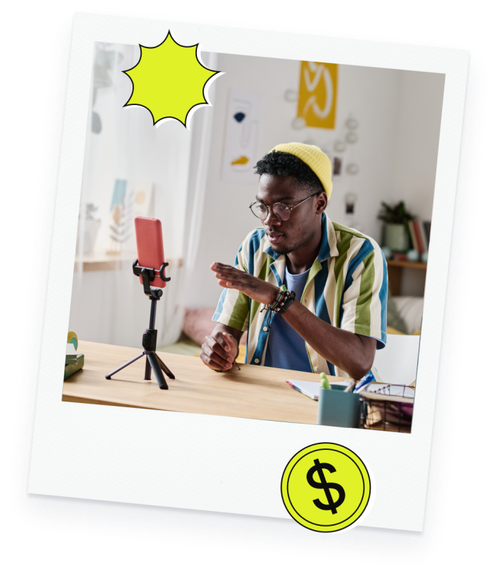 a polaroid-style photo of a man recording himself with his cellphone on a tripod stand, icons of a starburst and dollar sign