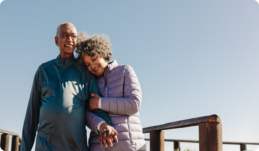 couple on dock by water