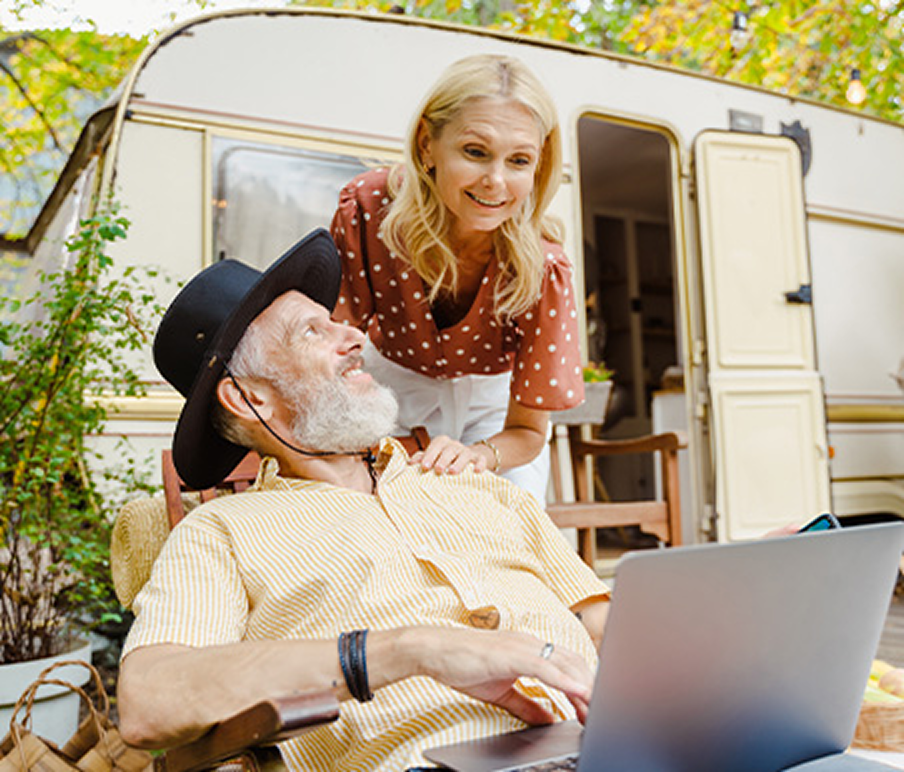 people outside of an RV trailer