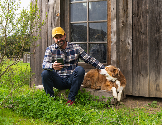 Man by Barn